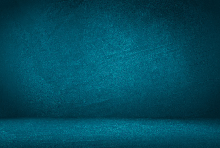 复古格伦蓝色混凝土纹理工作室墙壁背景与渐晕。