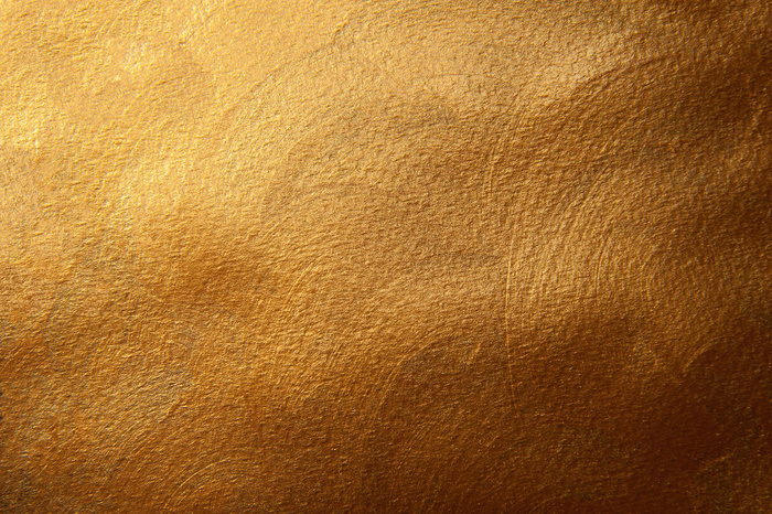 金色彩绘纹理背景。装饰面。