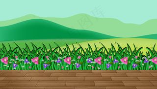 山地背景下的花田和绿草