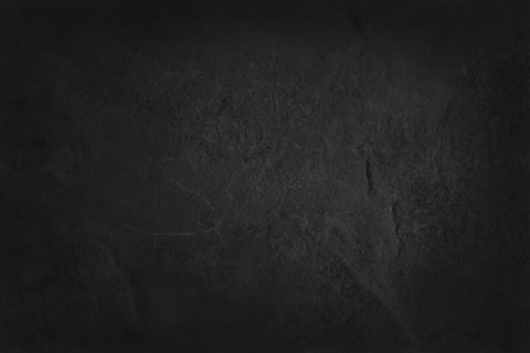 深灰色黑色板岩纹理，背景为天然黑色石墙。