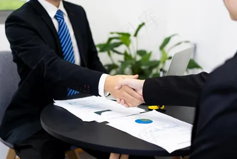 成功人士商务合作握手摄影图 成功人士商务合作握手摄影图
