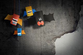 万圣节蝙蝠家庭为万圣节概念背景。手工艺品diy。