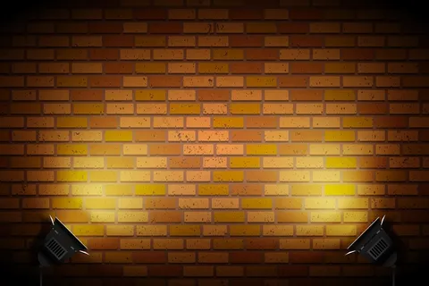 带聚光灯的砖墙墙纸