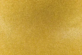 金色闪亮金色闪亮质感圣诞抽象背景。