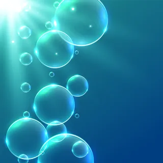 阳光照射下的水下漂浮气泡 阳光照射下的水下漂浮气泡