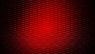 碳纤维背景上的发光红灯