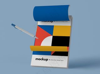 带几何图形的笔和记事本的正视图