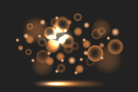深色背景上的Bokeh渐变深褐色色调灯光