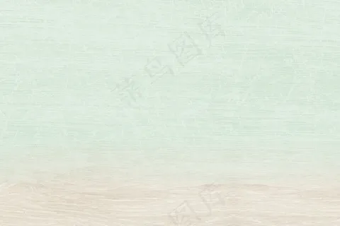 米色木制品背景的纯淡绿色