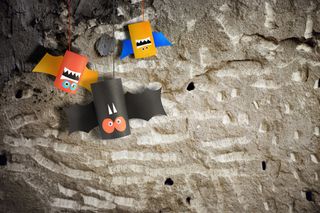 万圣节蝙蝠家庭为万圣节概念背景。手工艺品diy。