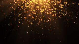 2020年新年。博克背景。灯光抽象。圣诞快乐背景。金光闪闪。散焦粒子。黑色隔离。覆盖。金色