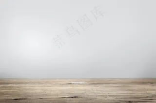 具有木地板产品背景的纯灰色墙