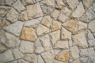 现代石砖墙背景。石头质地。