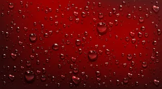 红色背景上的水滴