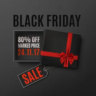 打开黑色空礼盒与红丝带，蝴蝶结和价格标签在黑暗的背景。顶视图。