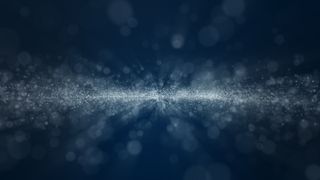 深蓝色和发光尘埃粒子抽象背景，光线照射光束效果。