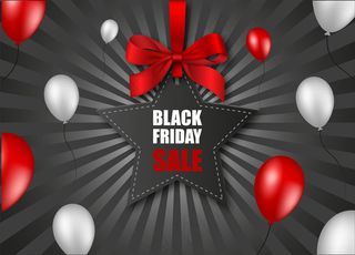 黑色星期五星型价签，红色蝴蝶结和黑色阳光背景上的气球