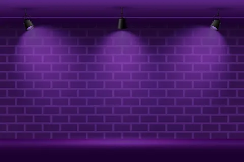 带聚光灯背景的砖墙
