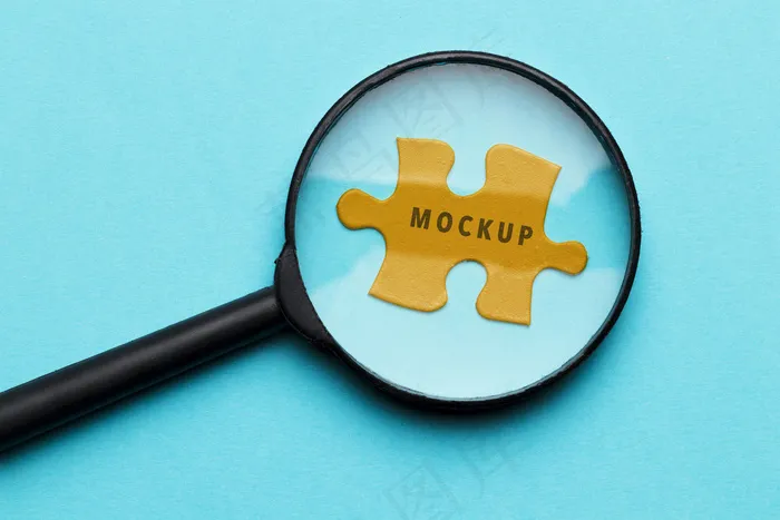 拼图上的俯视放大镜psd模版下载