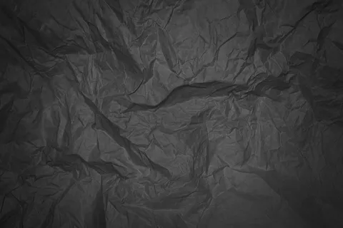 带渐晕的黑色皱折纸 带渐晕的黑色皱折纸