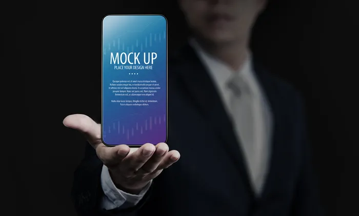手持智能手机屏幕模型样机的商人