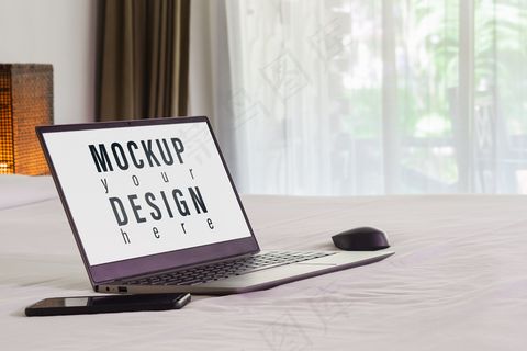 床上的笔记本电脑模型样机