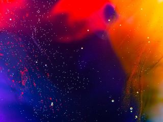 彩色抽象背景，有颜料和气泡