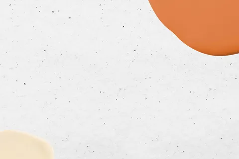 在白色的橙色和黄色最小油漆