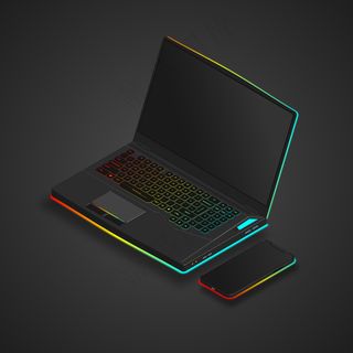 带有霓虹灯和智能手机的游戏笔记本电脑