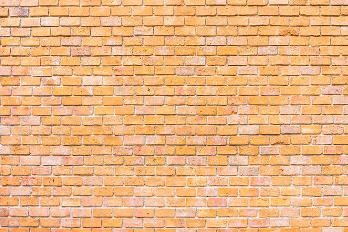 抽象而表面的老褐色砖墙纹理背景