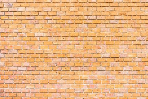 抽象而表面的老褐色砖墙纹理背景