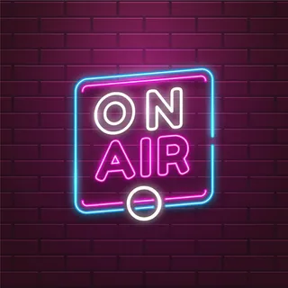 墙上有霓虹灯框架的空气标志