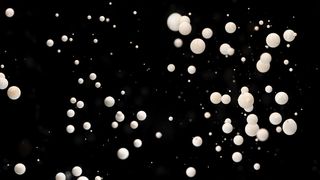 黑色背景的水中多个抽象亚克力球