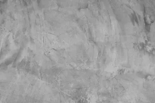 灰色混凝土纹理墙肮脏的背景。