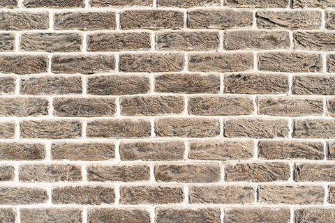 砖墙。白填充灰砖纹理