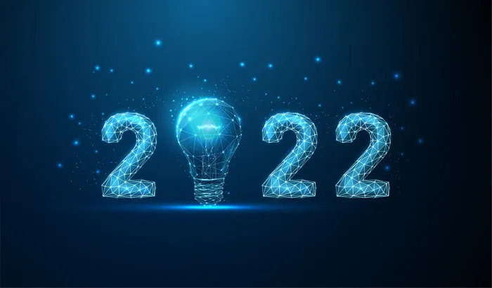 抽象的快乐 2022 年新年贺卡与灯泡低聚风格设计线框矢量