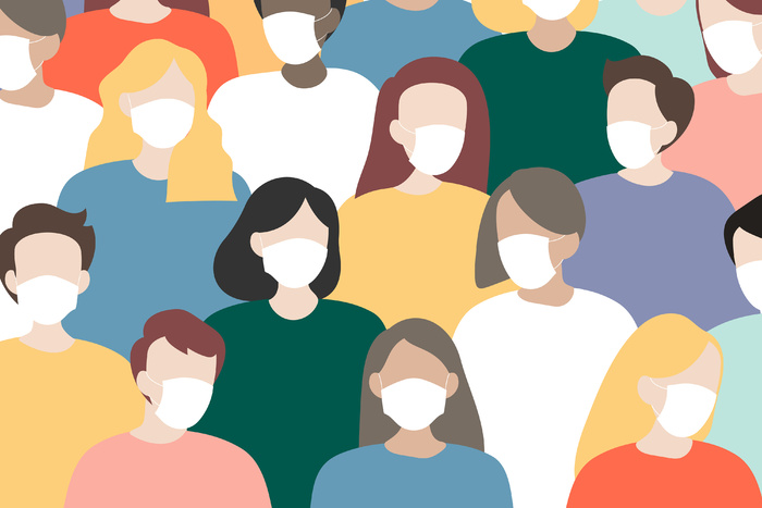 在covid-19爆发期间戴防护口罩的一群人