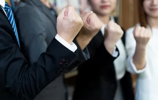 团队商务合作一起加油摄影图