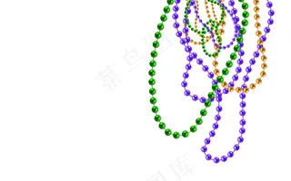 金色，绿色，紫色的珠子孤立在木质背景上。狂欢节装饰品。