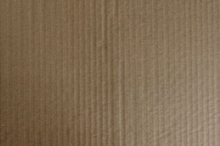 棕色瓦楞纸带纹理的背景