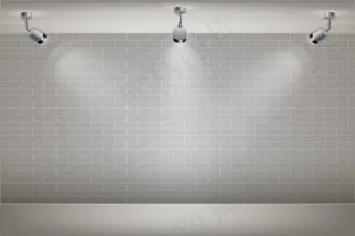 带聚光灯背景的白砖墙