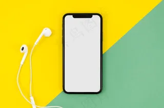 带耳机的顶视图手机模型样机