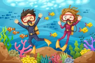 年轻男女戴着面具潜水员潜入海底