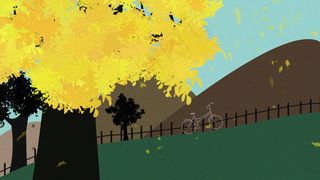 秋天大树山丘单车