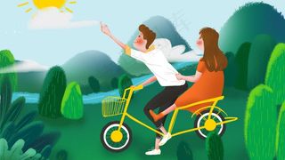 骑自行车去踏青的情侣