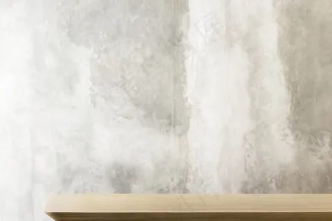 具有质朴灰墙产品背景的木桌 具有质朴灰墙产品背景的木桌