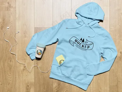 顶视图连帽衫，带咖啡杯和手机壳