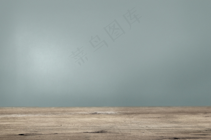 具有木地板产品背景的素色青色墙