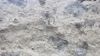 灰色油漆和开裂的砖墙纹理