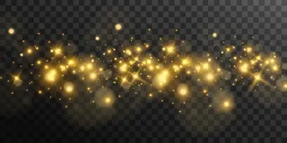 明亮美丽的金色火花在透明的背景上。